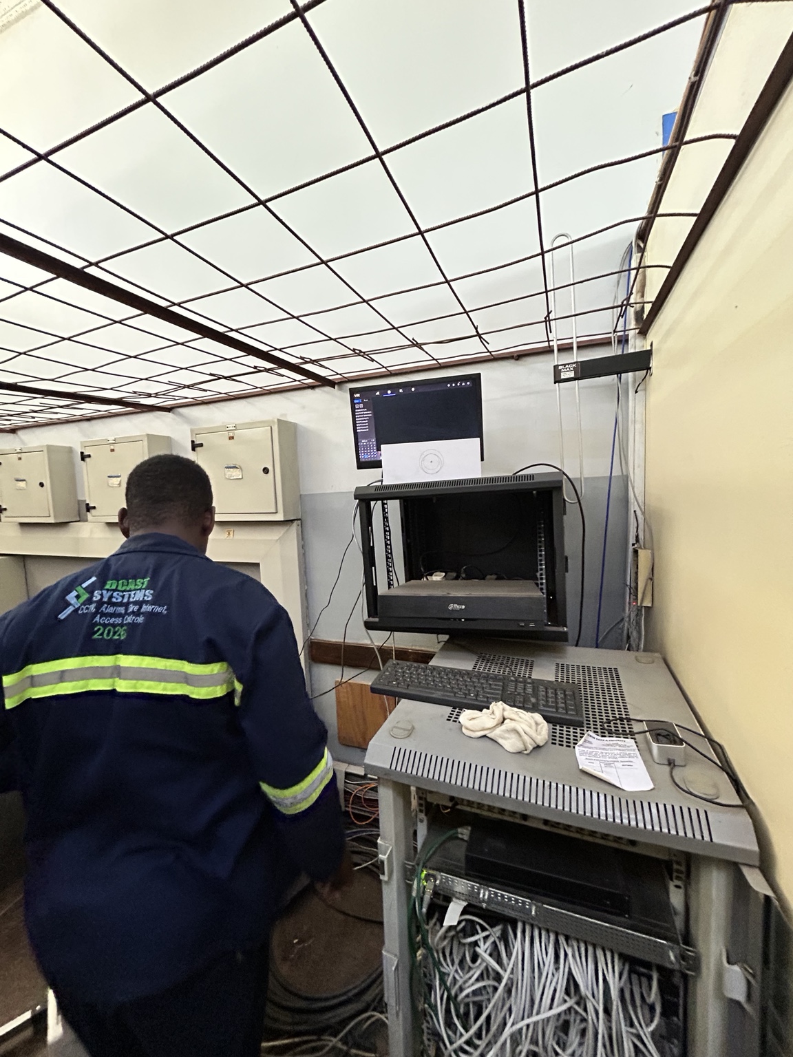 DCAST Systems technician working on electronic security infrastructure